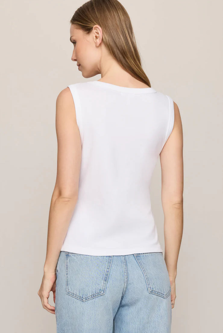 Model wearing the Z Supply Ellie V-Neck Tank, a sleeveless ribbed cotton tank featuring a flattering V-neckline, wide bra-friendly straps, and a fitted silhouette. The versatile essential is styled with casual bottoms for an effortless everyday look.