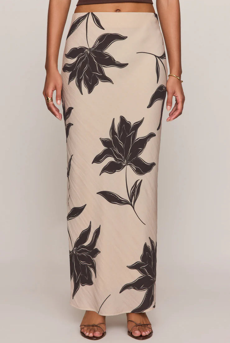 Straight floral midi skirt in a lightweight textured rayon blend with a comfortable elastic waistband. An easy, versatile piece with a timeless print and effortless drape.