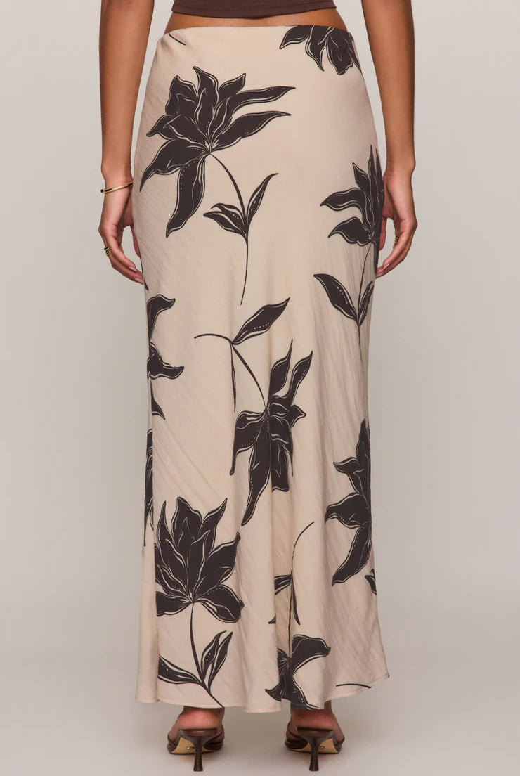 Straight floral midi skirt in a lightweight textured rayon blend with a comfortable elastic waistband. An easy, versatile piece with a timeless print and effortless drape.