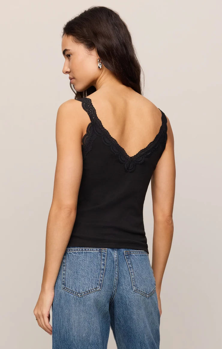 Fitted baby rib cotton tank with a lace-trimmed V-neckline and wide straps. A soft, feminine essential that's perfect for layering or wearing on its own.