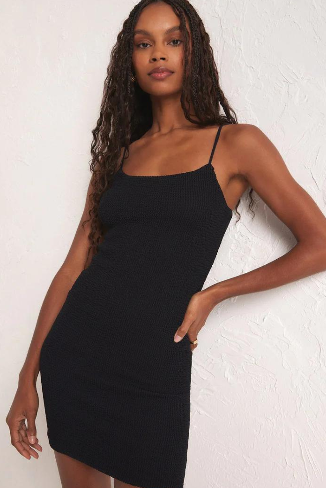 Z Supply Azure Crinkle Knit  Mini Dress- Black The perfect mini has arrived. Fitted, with a flattering scoop neckline and adjustable straps, it looks just as good with sneakers as your fave boots.