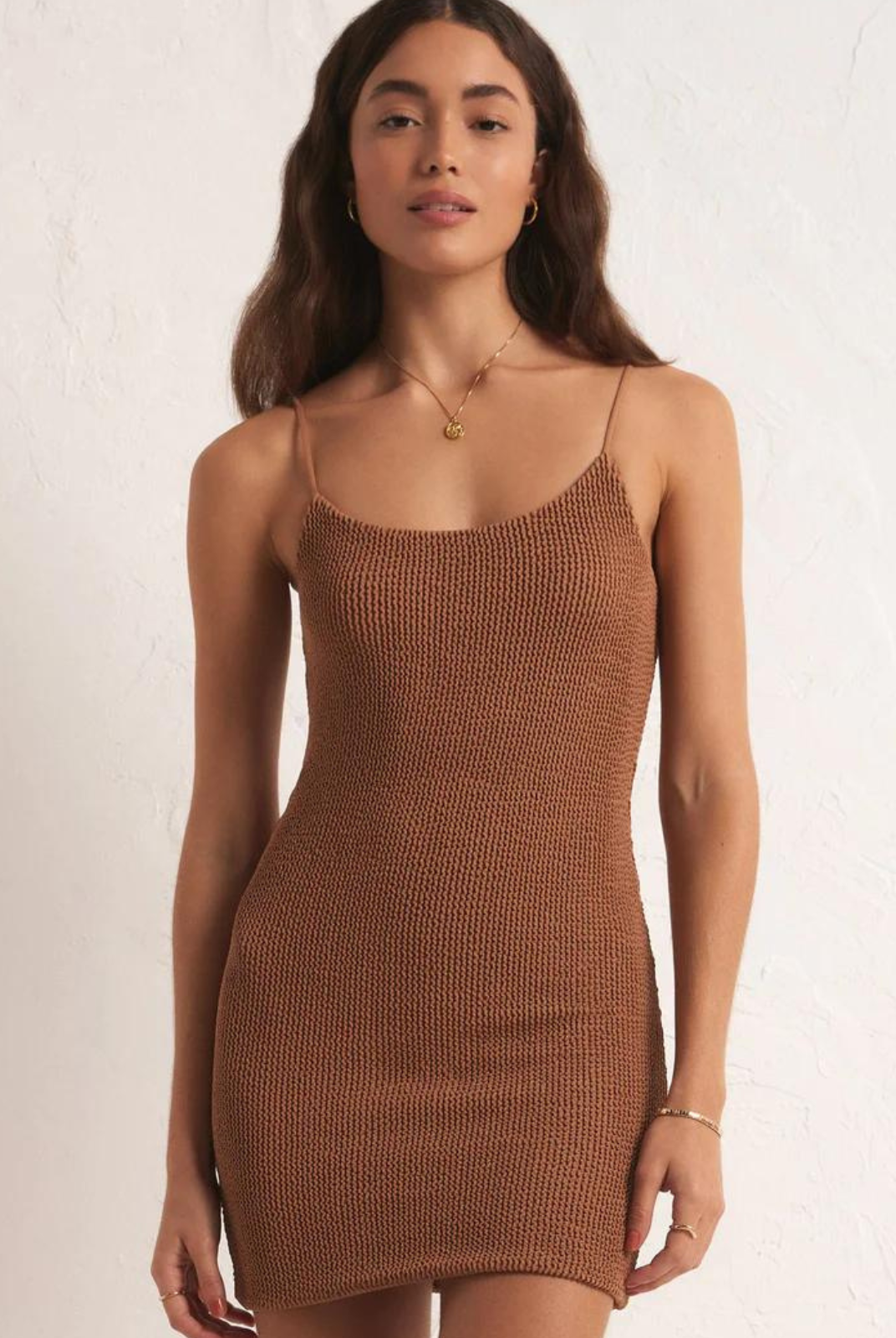 Z Supply Azure Crinkle Knit  Mini Dress- Bronzer. The perfect mini has arrived. Fitted, with a flattering scoop neckline and adjustable straps, it looks just as good with sneakers as your fave boots.