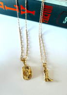 Ella & Lett 90s Country Necklace. Who didn’t love 90s country? Show your love of country music with these cowboy hat and cowboy boot necklaces. Perfect for layering.