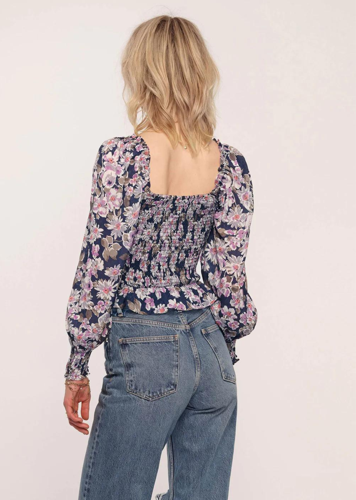 Heartloom Ariana Top. Our Ariana Top is effortlessly feminine. It has a softly ruched bodice and sweetheart neckline. The blouson sleeves and romantic floral print are perfect for date night.