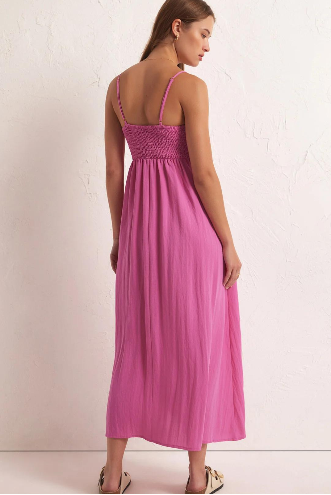 Z Supply Beachside Midi Dress - Heartbreaker Pink Vacation is calling!  The most perfect midi dress that is fit for the tropics.  Comfy, cute and flattering, it features: Fitted, Smocked Bodice Adjustable Straps Full Skirt Lined Regular Fit 90% Rayon 10% Nylon Style #ZD231223 Fits True to Size