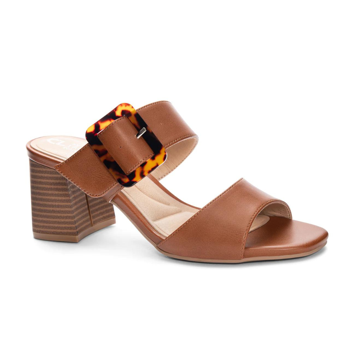 Chinese Laundry  Briana Slide Sandal- Tan. warm weather looks by pairing these women's CL by Laundry Briana tan (brown) sandals with your favourite jeans, skirts, dresses, and more. Crafted with synthetic upper, these two banded sandals have a round open toe, oversized buckle detail at the instep band for a unique look, synthetic lining and padded synthetic sockliner for comfort The durable TPR outsole with stacked block heel heightens the appeal.