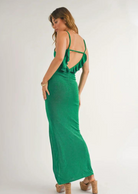 Sage The Label Cacti Open Back Ruffled Maxi Dress.Embrace the bold and beautiful with our Jade Cacti Open Back Ruffled Maxi Dress. The vibrant jade colour and elegant ruffled design will make you stand out in any crowd. Whether for a casual day out or a special occasion, this dress will bring both comfort and style to your wardrobe.