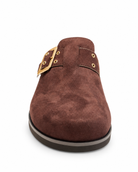 Chinese Laundry Cove Suede Clogs in Chocolate, featuring a rich brown faux-suede upper, gold-tone buckle with a rounded closed toe, open-back slip-on design, and contrasting dark sole.