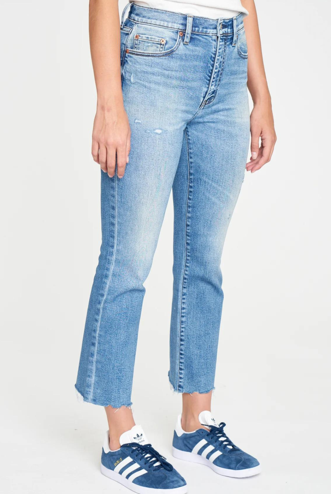 Daze- Shy Girl Crop Flare-PDA Need a Hug? This cropped flare is made using our "Hug" denim. It is a slightly heavier fabric with a stretch that hugs your body, while smoothly cinching you in. In a medium wash with vintage fading, this is a core jean for your closet.