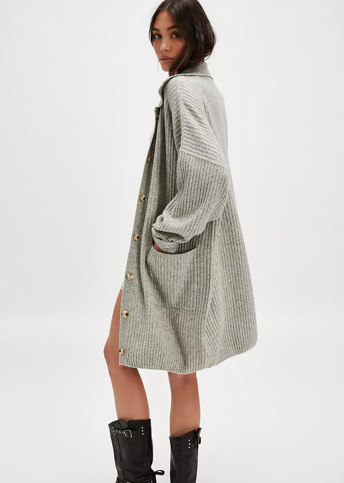 Free People Emmy Cardi.Essential to every collection of layers, this classic cardi is featured in a soft ribbed knit fabrication and slouchy silhouette with button-front closures and a collared-neckline.