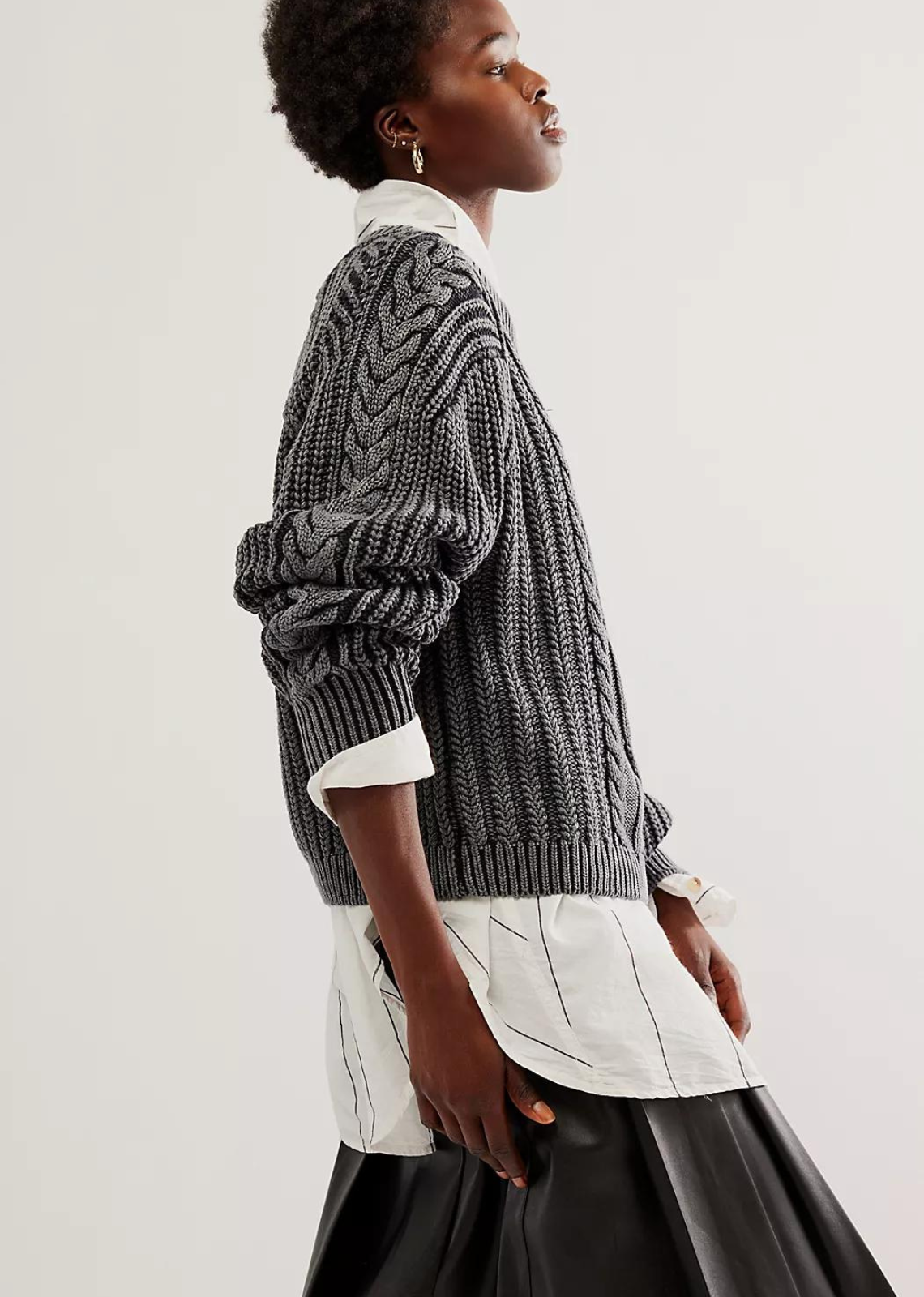 Free People Frankie Cable Sweater- Black A new take on a forever classic, this staple sweater is featured in a chunky knit fabrication with timeless cable detailing throughout for an added special touch.