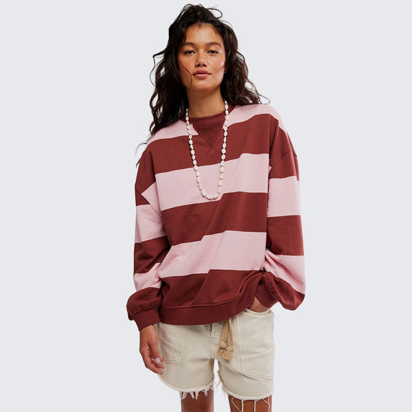 woman wearing strawberry wine combo striped oversized crew 