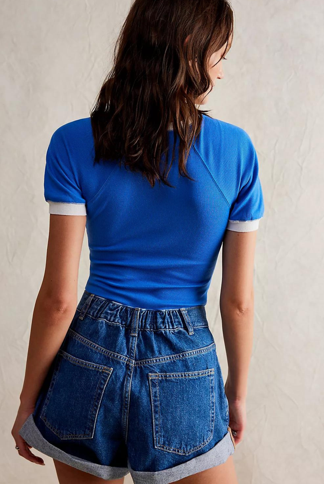 Free People Danni Shorts. Perfectly pleated, these timeless denim shorts have the perfect touch of vintage-inspired charm.