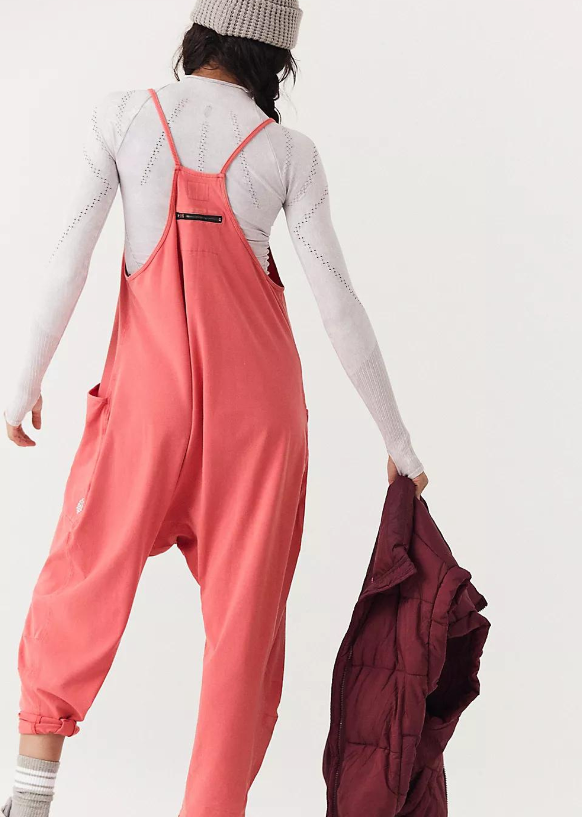 This soft and comfy onesie features a slouchy, relaxed-fitting design with a dropped crotch and convenient side pockets.