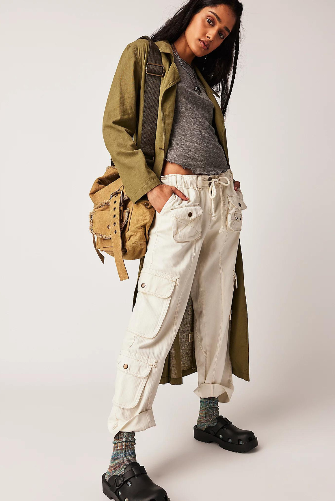 Free People Tahiti Cargo Pant- Tofu. The coolest way to cargo, these timeless pants are featured in a low-rise, slouchy straight silhouette with utility-style pockets throughout and smocked waist for ease.