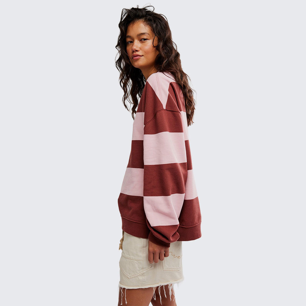 woman wearing strawberry wine combo striped oversized crew 