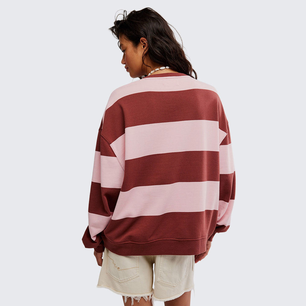 woman wearing strawberry wine combo striped oversized crew 
