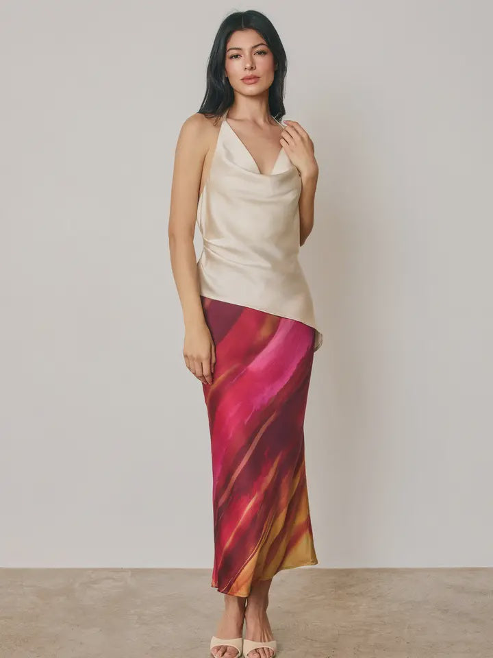 Golden Hour A-line maxi skirt in a watercolor-inspired stripe print with a smooth satin finish, featuring a hidden elastic waistband, pull-on design, and partial lining.