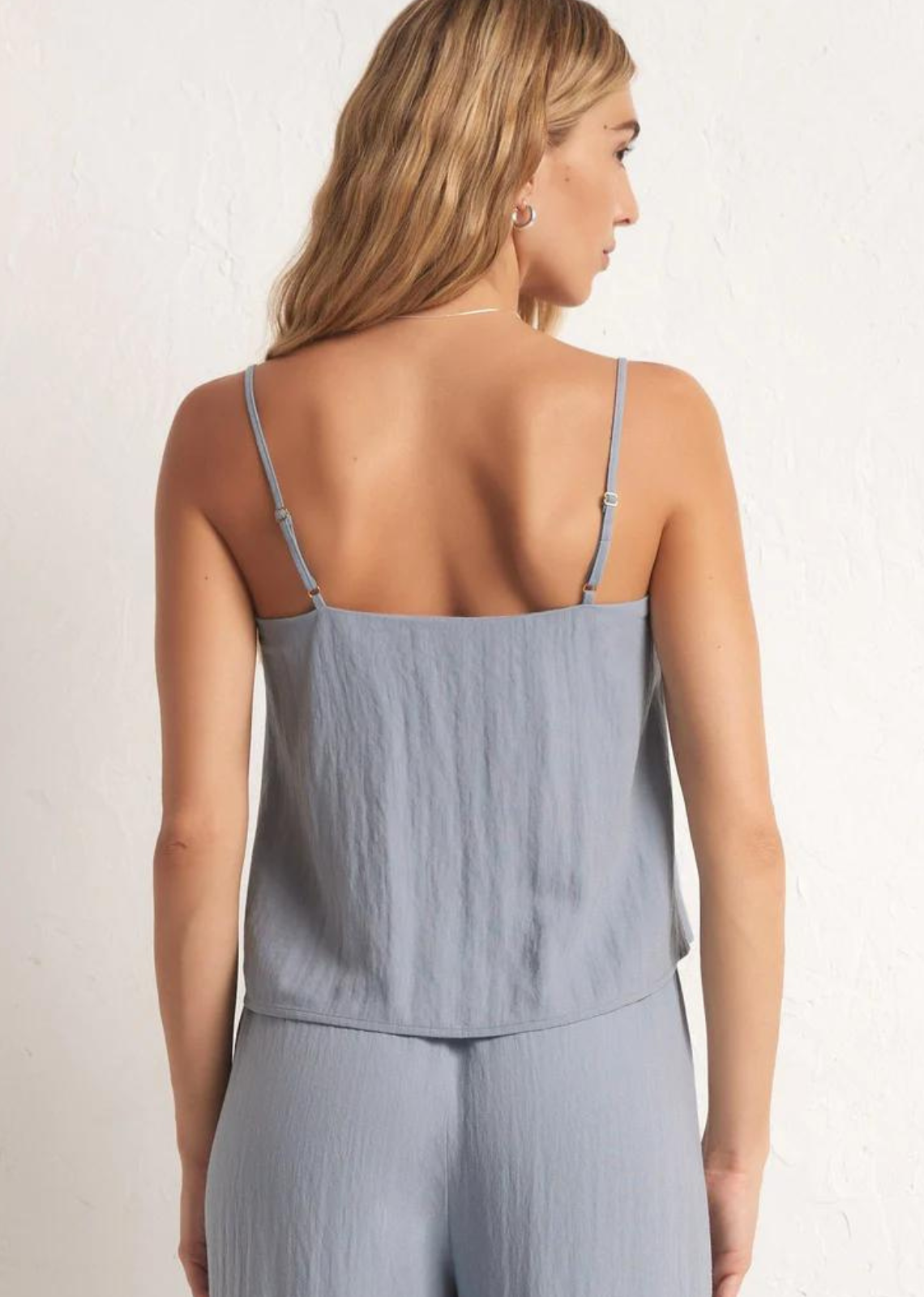 Z Supply Havana Tank Looking for your next going-out tank? The Havana Tank is light and airy and flows down from the fitted interior bra to sit just below the waist. The squared neckline makes it easy to dress up or down.
