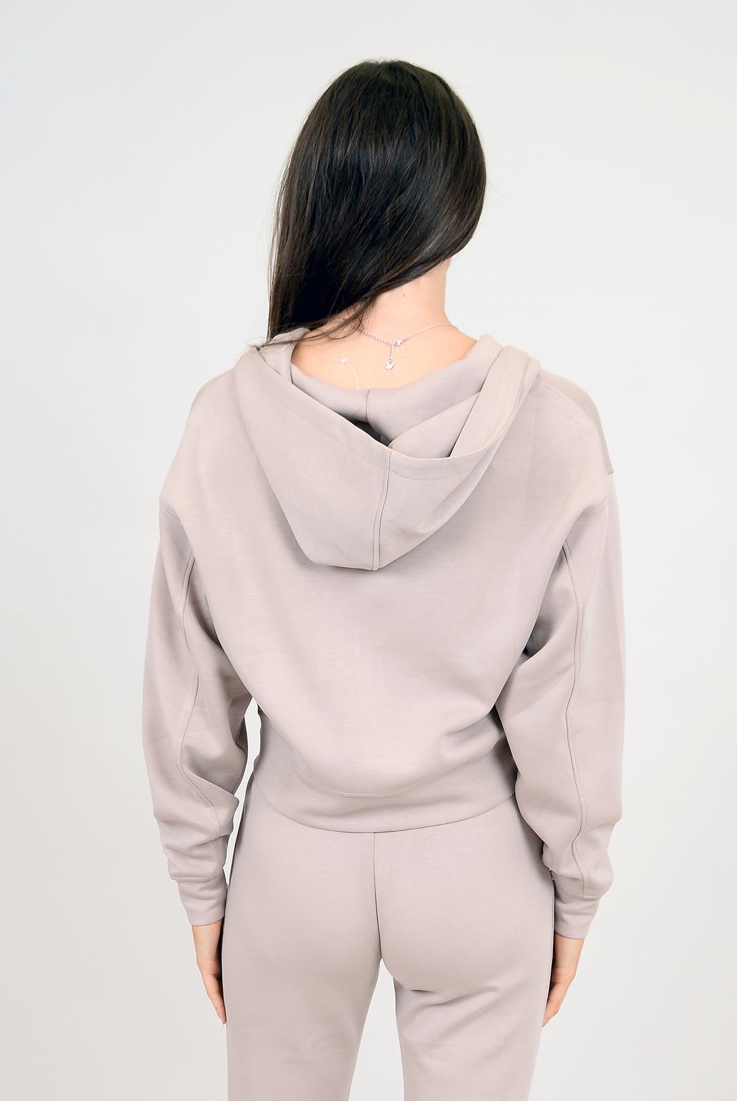 Haidelyn Soft Scuba LS - Taupe. This scuba fabric is oh so comfy! A must have staple piece for your wardrobe, sweater is cropped but a perfect pair to the Senza Soft Scuba Shorts!