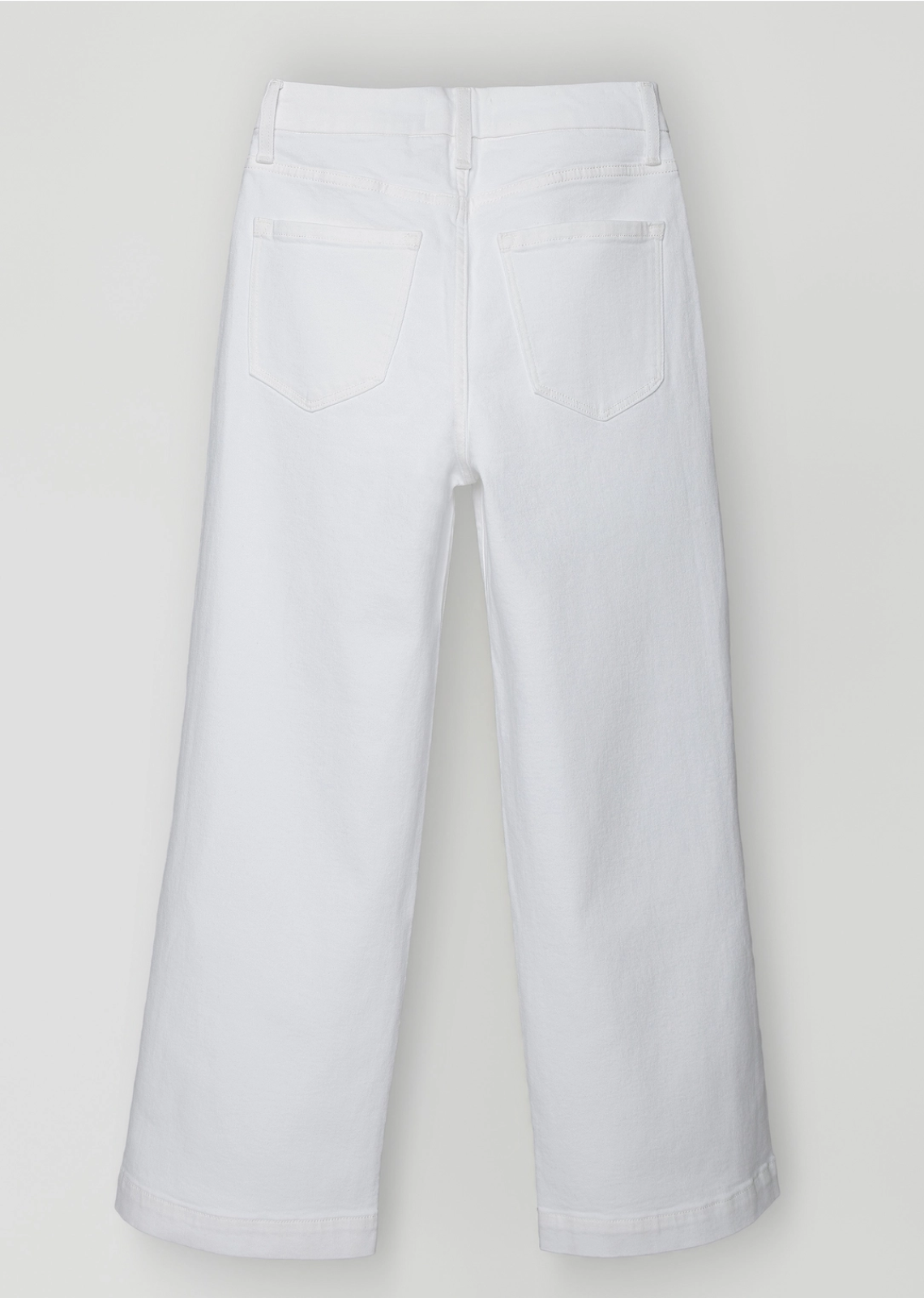 White pants on a light gray background Lee & Me Boutique