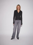 John & Jenn Maura Cardigan featuring a flattering V-neckline, delicate button-front closure, long sleeves, and a relaxed silhouette in a soft knit fabric for a polished, feminine look.