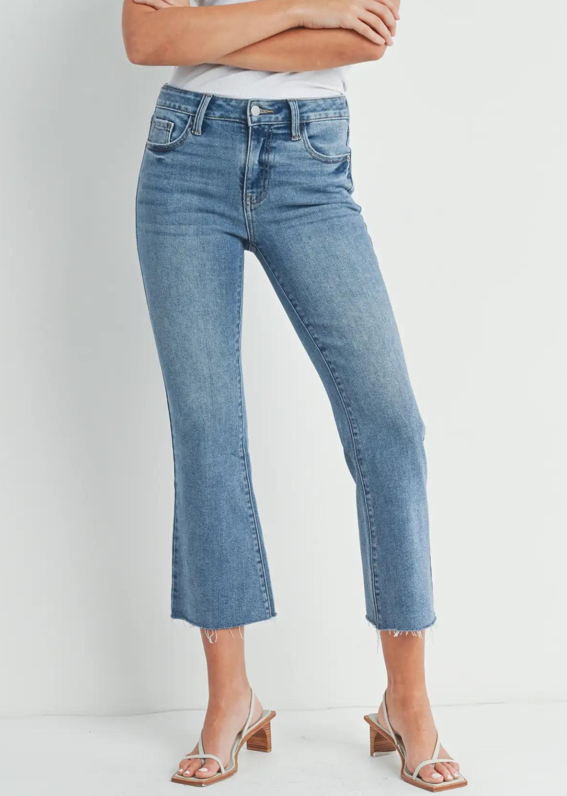 Just Black Stretch Cropped Flare. <p><span>Take a break in this comfortable flare jean that’s just a touch slimmer through the legs. A high-rise waist and subtle distressing around the hems make this the perfect pair for leisurely strolls or long lunches.
