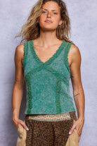 Lila Lace Thermal Cami in Pine Green featuring a slim-fit silhouette, sleeveless design, V-neckline with delicate lace trim, and vintage-washed thermal fabric.