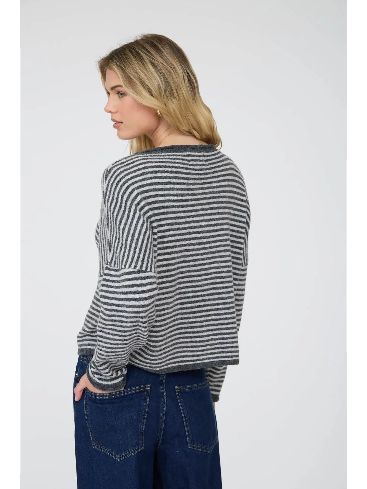 Charcoal Lottie Striped Knit Cardigan featuring a relaxed, slightly cropped fit, round neckline, long sleeves, button-front closure, and classic horizontal stripe pattern.