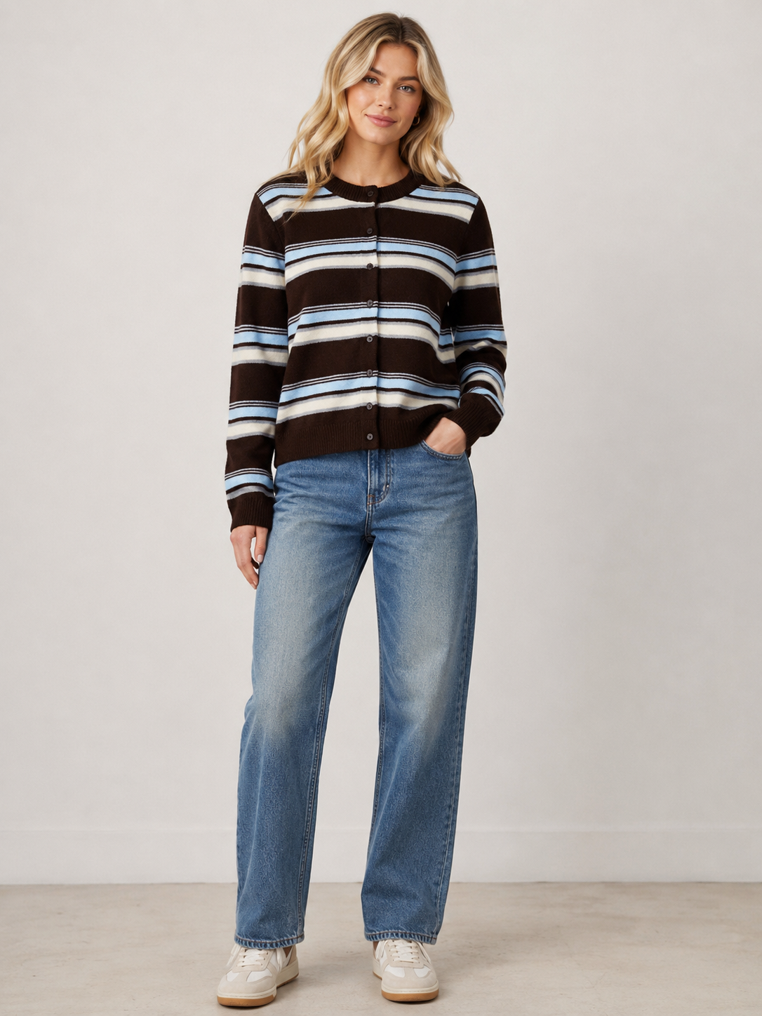 Brown and blue striped knit cardigan featuring a relaxed fit, soft textured fabrication, button-front closure, and a cozy layered design perfect for everyday styling.