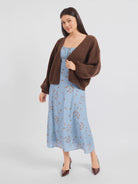 Sadie & Sage Marley Dolman Sleeve Cardigan featuring a soft, fuzzy knit, open-front design, slightly cropped length, and relaxed voluminous dolman sleeves.