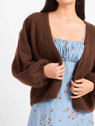 Sadie & Sage Marley Dolman Sleeve Cardigan featuring a soft, fuzzy knit, open-front design, slightly cropped length, and relaxed voluminous dolman sleeves.