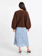 Sadie & Sage Marley Dolman Sleeve Cardigan featuring a soft, fuzzy knit, open-front design, slightly cropped length, and relaxed voluminous dolman sleeves.