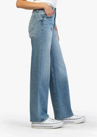 Kut From The Cloth Sienna High Rise Wide Leg - Coach. Sanded details render a timeworn appeal to rich indigo jeans cut in a wide-leg silhouette with frayed hems that further their well-loved look.