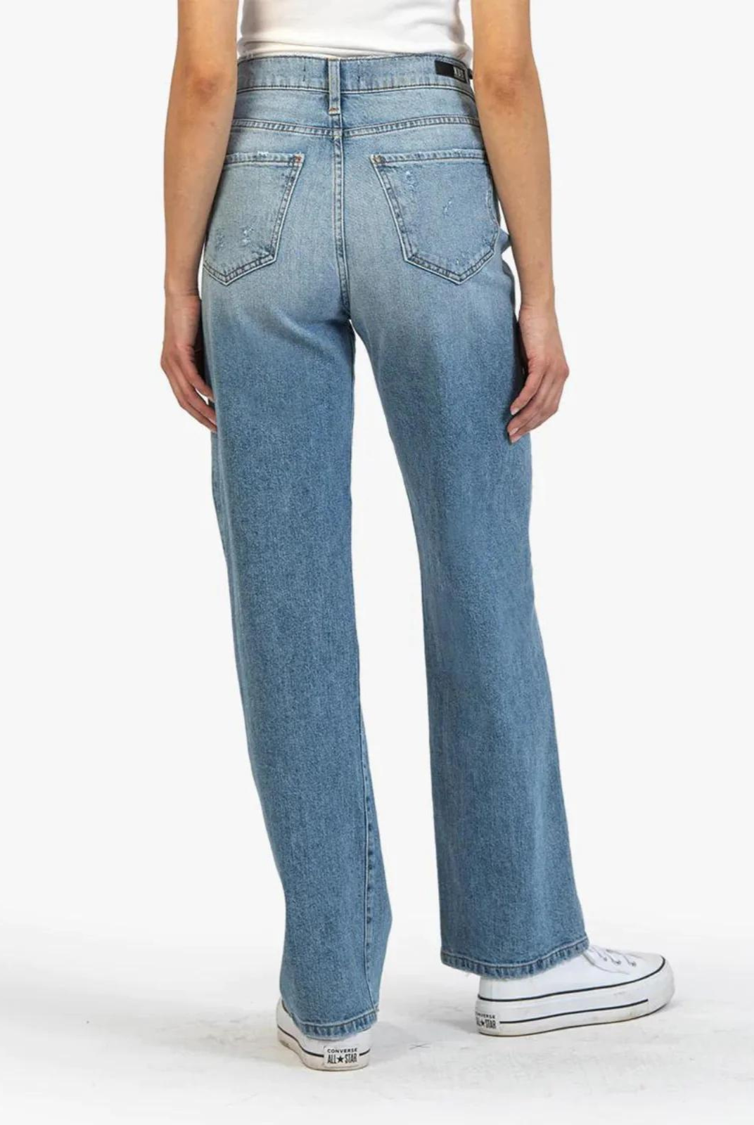 Kut From The Cloth Sienna High Rise Wide Leg - Coach. Sanded details render a timeworn appeal to rich indigo jeans cut in a wide-leg silhouette with frayed hems that further their well-loved look.