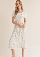 Sadie & Sage Spring Cleaning Midi Dress. Get ready to twirl into spring with our darling Spring Cleaning Midi Dress! With perfect spring garden vibes, this dress is&nbsp; an absolute delight to wear wherever you go. Say yes to this dress and add a touch of playful and quirky charm to your wardrobe!