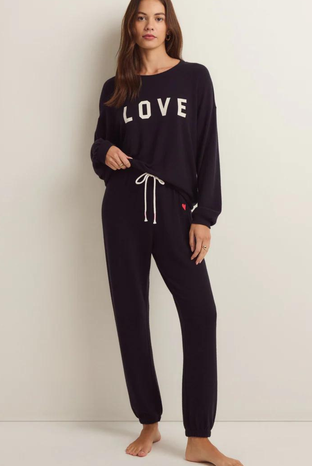 Z Supply Team Love LS Top We're on Team Love!  Relaxed Cloud Knit: 62% Polyester, 34% Rayon, 4% Spandex Screen print "love" Soft Brushed Knit Machine Wash Cold, Tumble Dry Low or Lay Flat to Dry, Do Not Dry Clean Style #ZLT241117