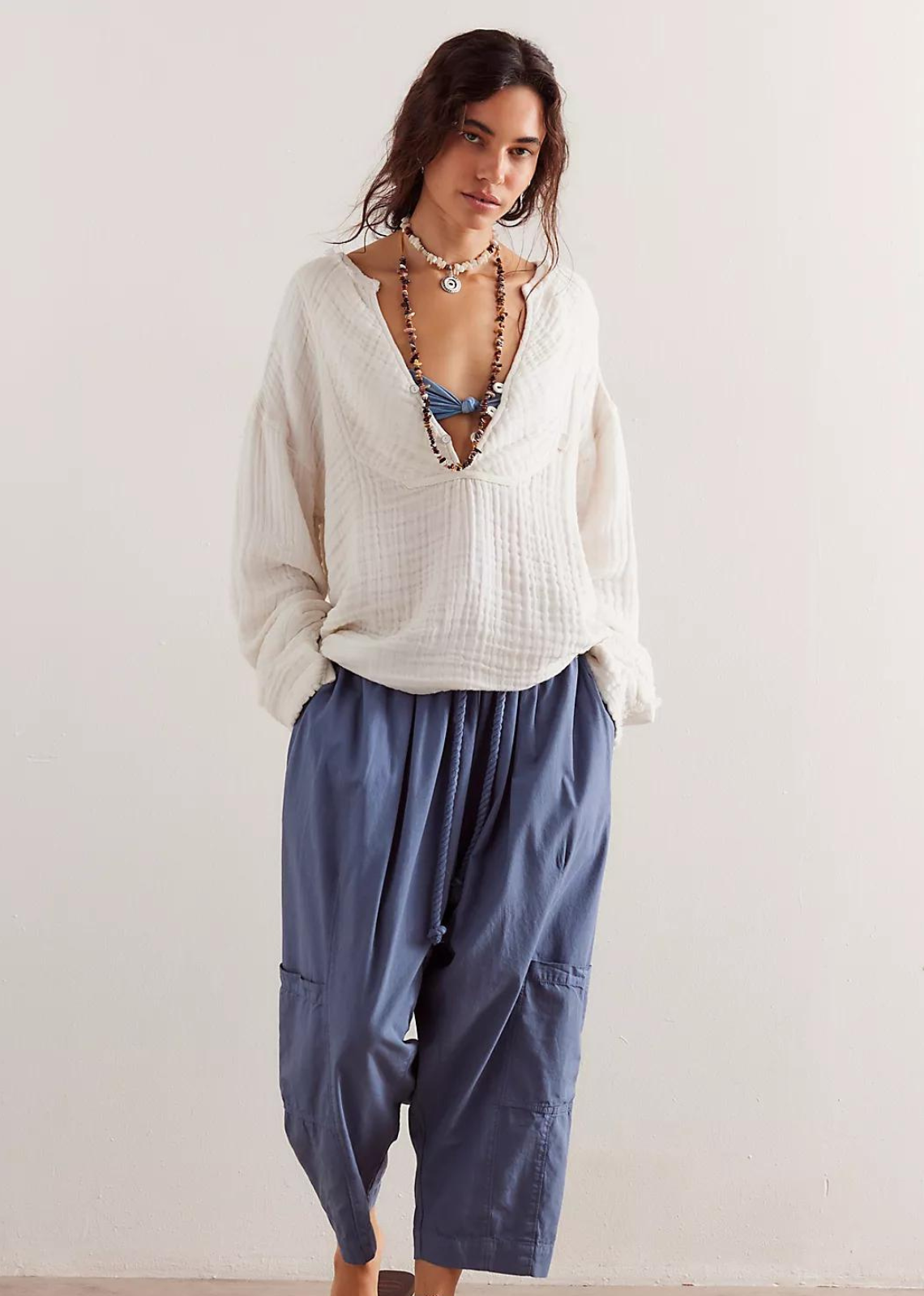 Free People Easy Sunday Pullover.Easy and effortless, this top from our&nbsp;We The Free&nbsp;collection features a soft cloth fabrication and oversized fit with a V-neckline and drop-shoulder sleeves.