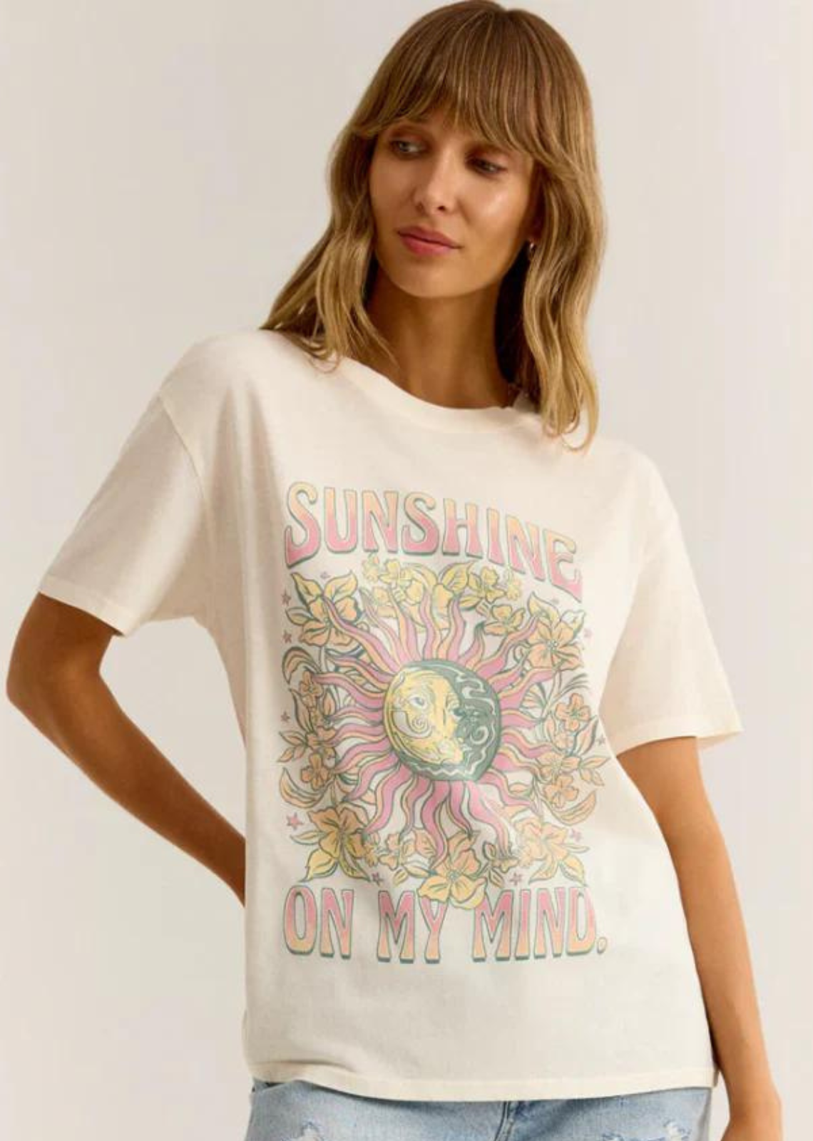 Z Supply Sunshine Boyfriend Tee. Get ready to spread sunshine wherever you go with our Sunshine Boyfriend Tee! This must-have top features a charming poster art screenprint, a classic crew neck, and a vintage wash for a timeless look. Made from soft hand cotton jersey for ultimate comfort. Bring a little brightness to your wardrobe today! Model is wearing a size small.