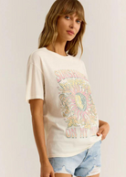 Z Supply Sunshine Boyfriend Tee. Get ready to spread sunshine wherever you go with our Sunshine Boyfriend Tee! This must-have top features a charming poster art screenprint, a classic crew neck, and a vintage wash for a timeless look. Made from soft hand cotton jersey for ultimate comfort. Bring a little brightness to your wardrobe today! Model is wearing a size small.