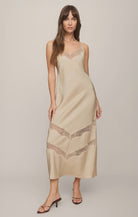Luxe satin midi dress featuring a V-neckline, delicate sheer lace insets, adjustable spaghetti straps, and a sleek regular-fit silhouette.