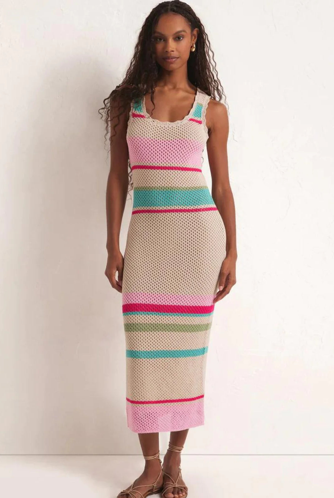 Z Supply Ibiza Striped Sweater Dress. You'll love the retro vibe of this sweater dress. Made to hug your curves in all the right ways, this lightweight crocheted midi features a flattering scoop neckline with a delicate lace trim.