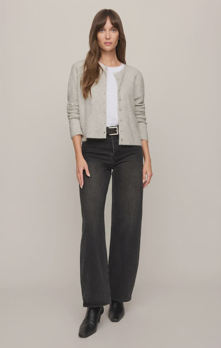 Relaxed crewneck cardigan crafted from cozy sweater yarn with a classic button-front closure and easy layering silhouette.