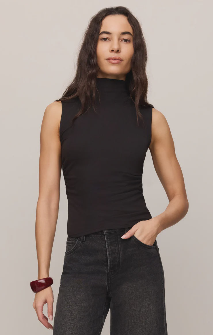 Close-fitting high-neck tank top in soft, stretchy baby rib fabric with subtle side ruching for a flattering, sculpted silhouette. A sleek, fitted essential that's perfect for layering or wearing on its own.