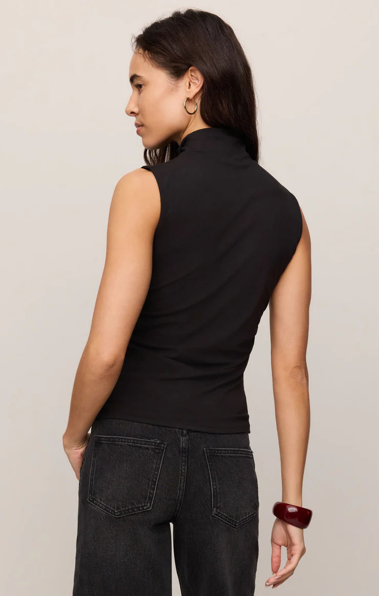 Close-fitting high-neck tank top in soft, stretchy baby rib fabric with subtle side ruching for a flattering, sculpted silhouette. A sleek, fitted essential that's perfect for layering or wearing on its own.