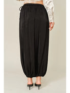 Zola Striped Satin Bubble Pants featuring a soft, glossy satin finish with a striped pattern, comfortable elastic waistband, adjustable drawstring side details, and functional side pockets. Designed with a relaxed, voluminous balloon silhouette and a flowy, lightweight feel for an effortlessly chic look.