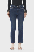 Hong Kong jeans featuring a comfortable mid-to-high-rise fit and stretchy denim, designed for versatile everyday wear that can be dressed up or down.