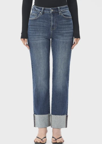 High-rise straight-leg jeans featuring a stitched cuff, sleek silhouette, and comfortable stretch denim for an effortlessly polished everyday look.