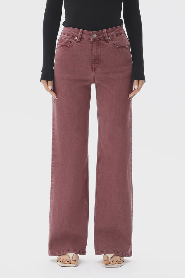 Burgundy New York jeans featuring a flattering mid-to-high-rise fit, streamlined silhouette, and comfortable stretch denim. The versatile style offers an effortless look for everyday wear or elevated outfits.