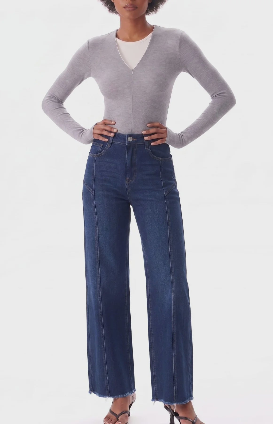 Bayeas New York high-rise wide-leg jeans featuring unique seaming, a flattering silhouette, and raw-edge hem for a modern, effortlessly edgy look.